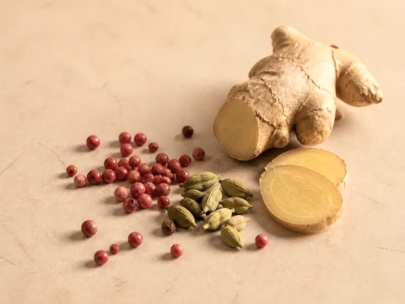 Pink peppercorns, green cardamom and fresh ginger